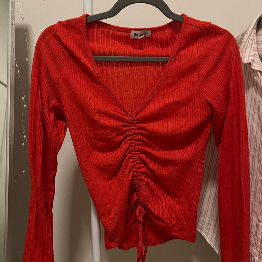 red long sleeve v neck sweater